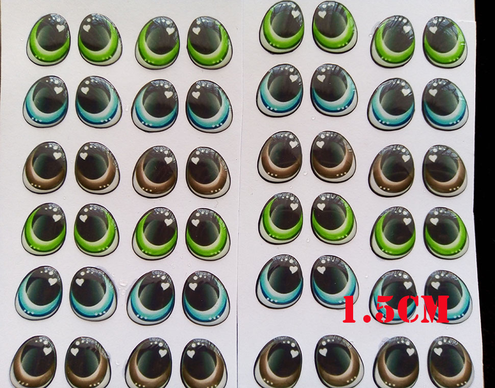 Cartón de Ojos Adhesivos ovalados de 1.5cm Resinados efecto 3d con relieve alto Pegatina