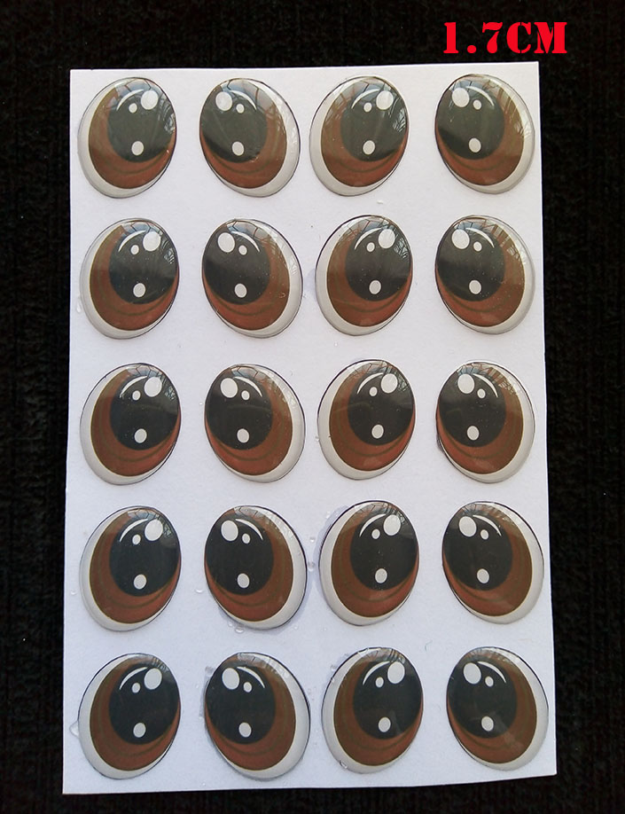 Cartón de Ojos adhesivos ovalados de 1.7cm tono Café para muñecos