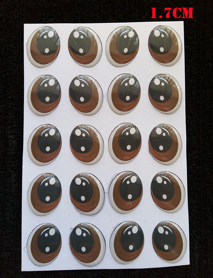 Cartón de Ojos adhesivos ovalados de 1.7cm tono Café para muñecos