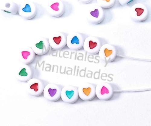 JUECO DE CUENTAS BLANCAS ACRÍLICO REDONDO PASANTE CON FIGURA DE CORAZÓN COLORES SURTIDOS PARA PULSERAS COLLARES O MANILLAS, INSUMOS PARA BISUTERÍA Y ARTESANÍAS