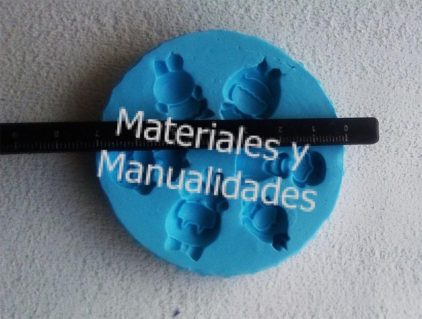 Molde en silicona para crear llaveros y aretes en pasta fría porcelanicron